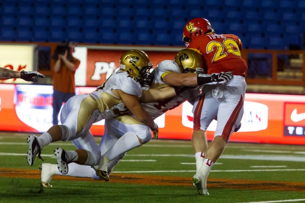 The bison defence makes a play.  Photo by Shawn Coates. 