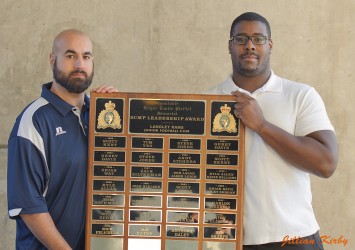 Anthony t, Daley-righreceiving the 2014-Langley Rams Leadership-Award from head coach and former Manitoba Bison Jeff Alamolhoda-left Photo by Jillian-Kirby